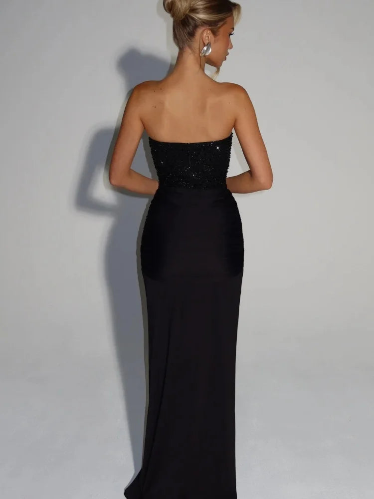 שמלת אלנה - מקסי מנצנצת עם הצהרה